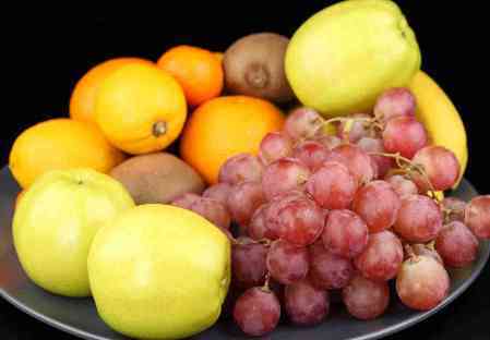 Weintrauben, Äpfel, Zitronen- Obst ist Gesund